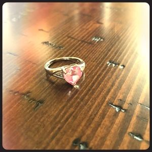 White gold ring with pink heart shaped stone